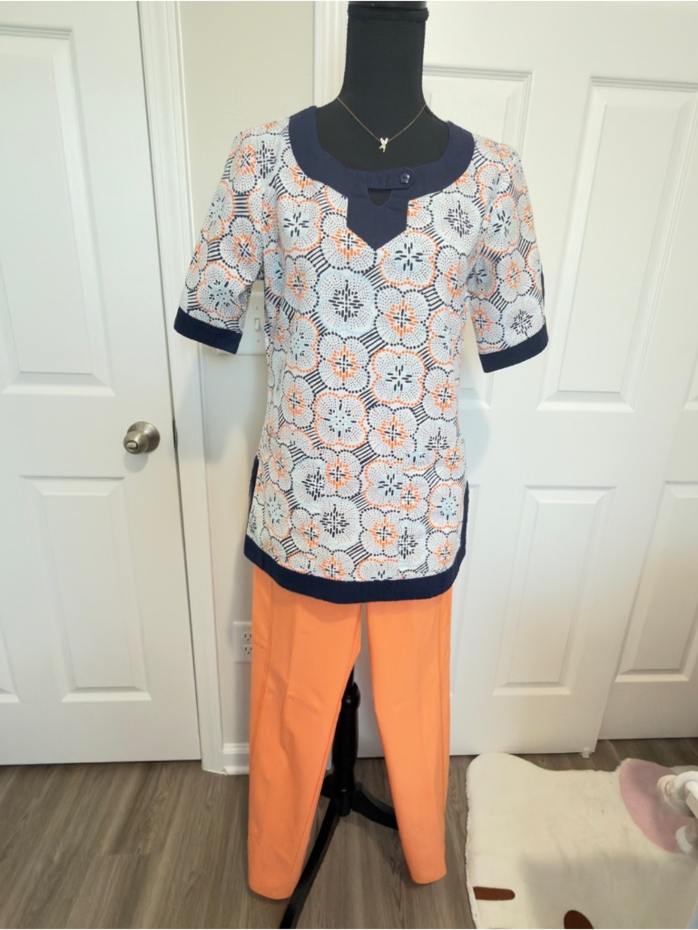 koi Navy and Orange Floral Scrub Top with Orange Scrub Pants